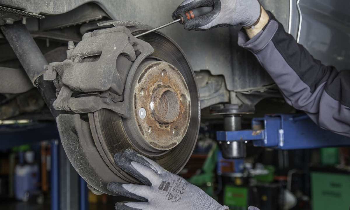 Man installing best brake pads