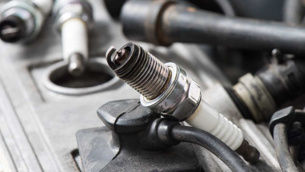 How Long Does A Car Inspection Take - Bad spark plug with soot